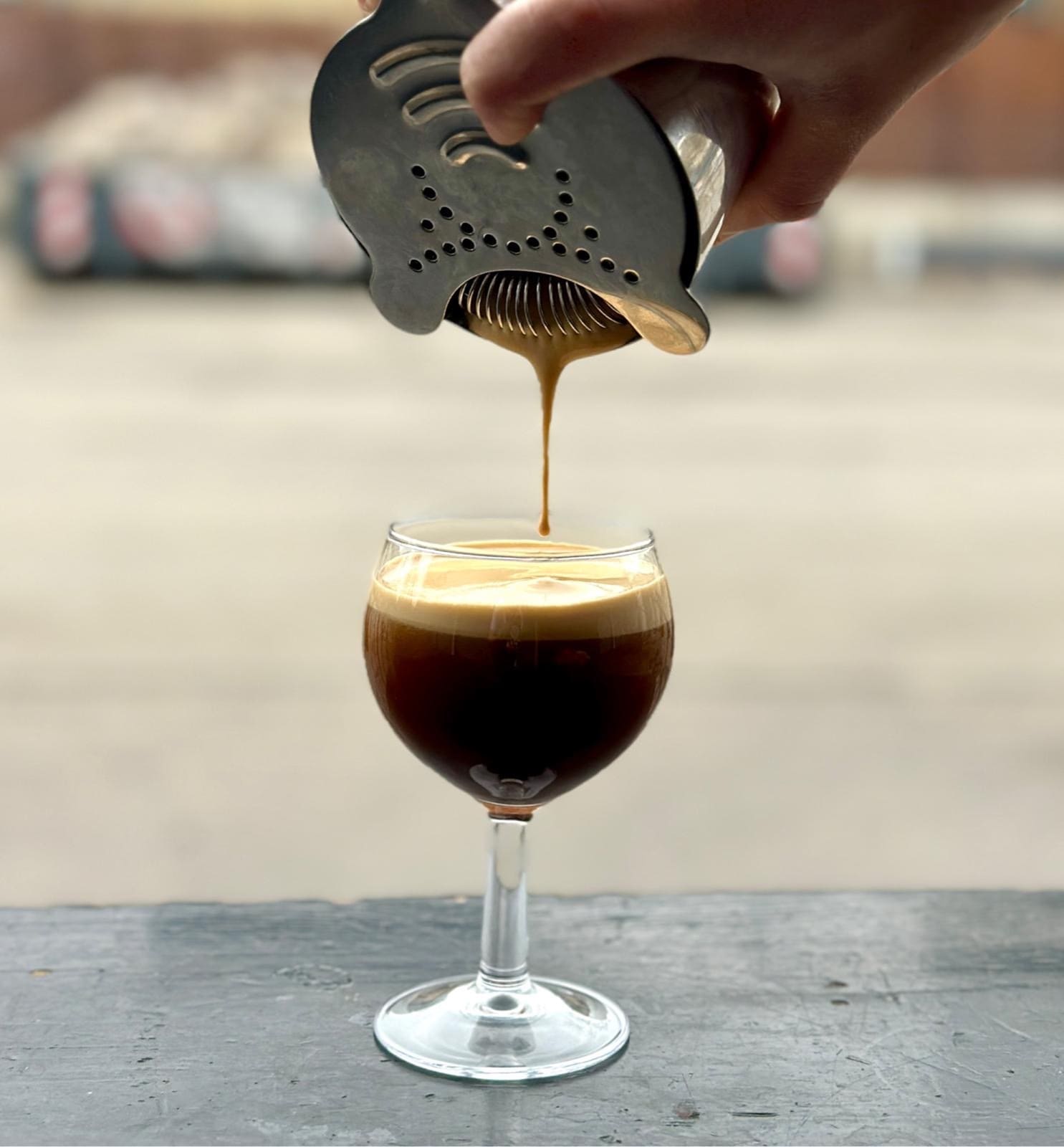 Espresso martini being strained